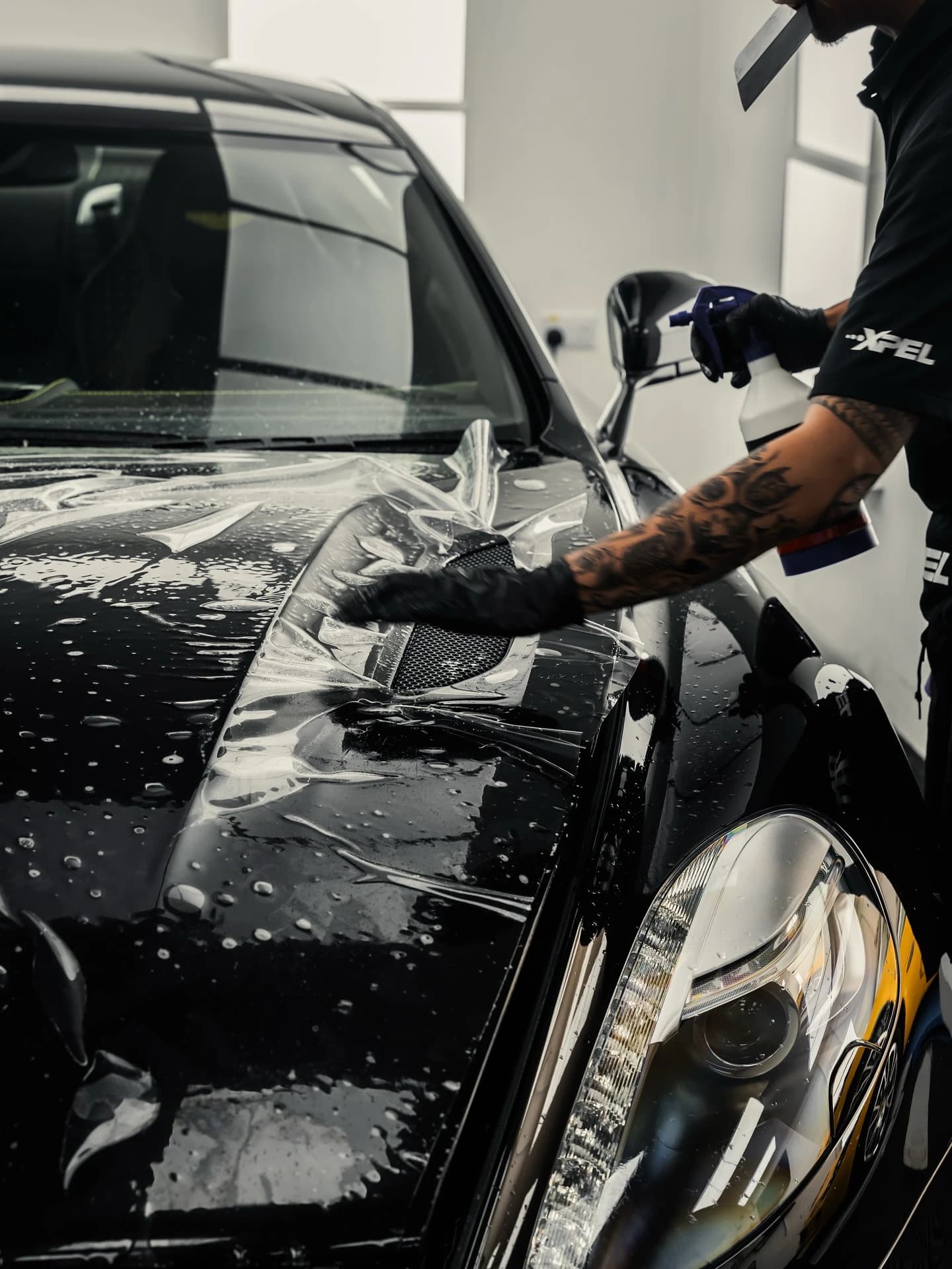 A vehicle being hand washed