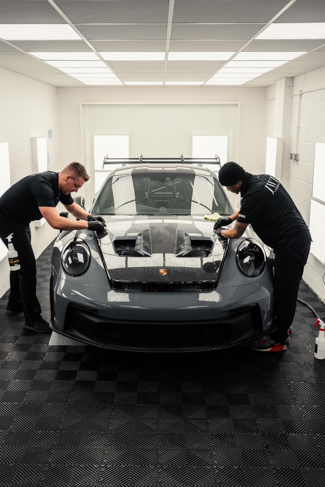Paint protection film being installed in the JWB studio